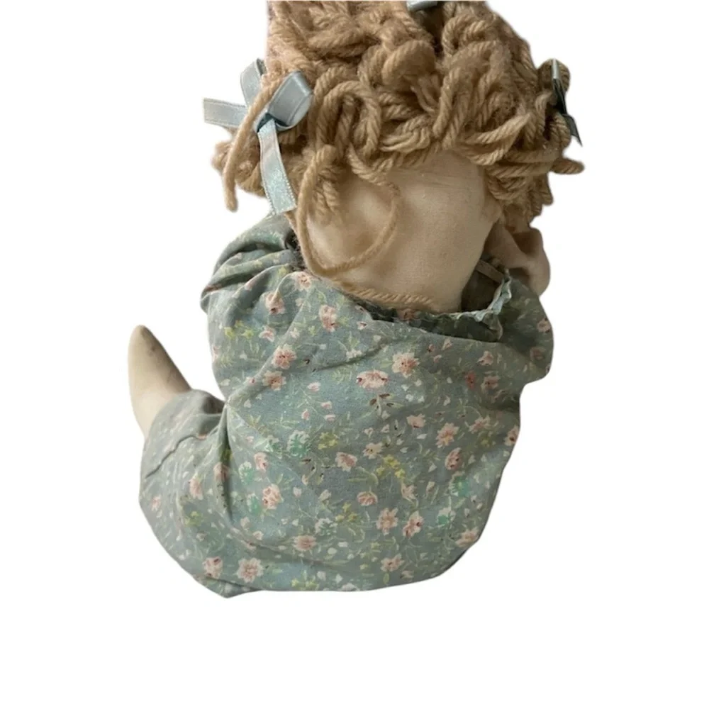 Stuffed Rag Doll with Wooden Wicker Rocking Chair